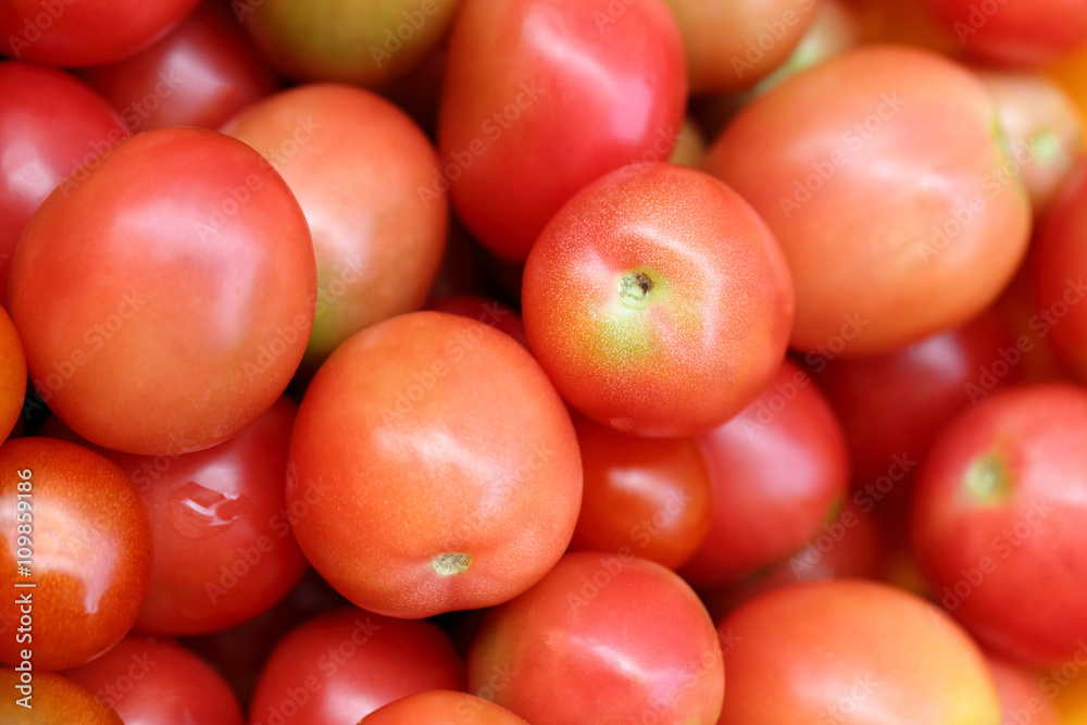 Background of red tomatoes, selective focus. Background of red tomatoes, selective focus.