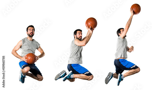 Man playing basketball jumping © luismolinero