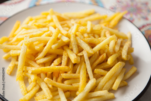 Plate full of crispy fries