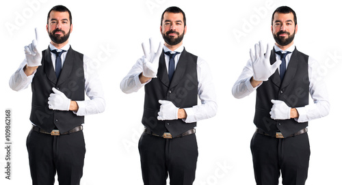 Luxury waiter counting three