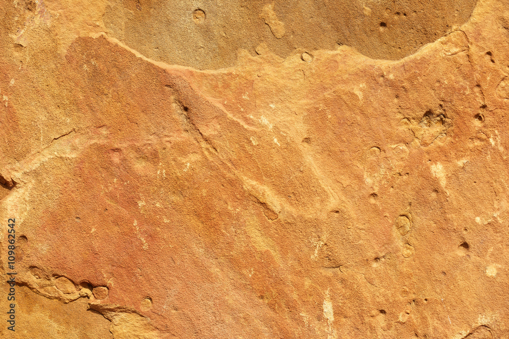 Fototapeta premium detail of an old orange sandstone surface
