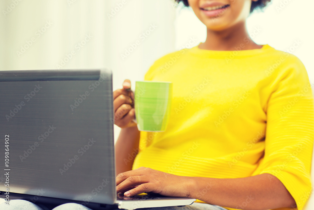 happy african american woman with laptop at home happy african american woman with laptop at home