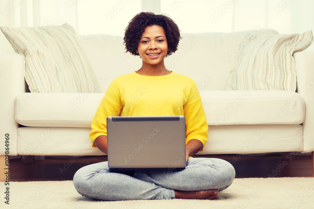 happy african american woman with laptop at home happy african american woman with laptop at home