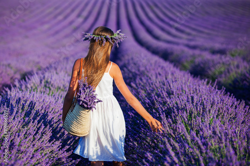 Young girl in the lavander fields photo