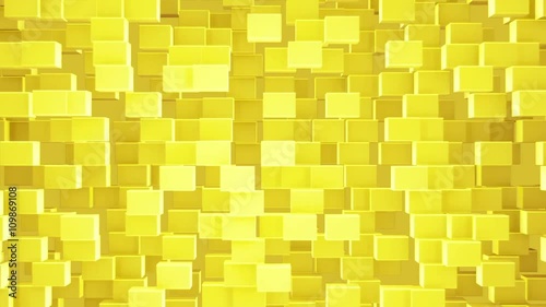 Abstract looped animated background based on the movement of golden-yellow cubes of crystals gathering and disintegrating into a wall consisting of bricks with the source of  light and refraction