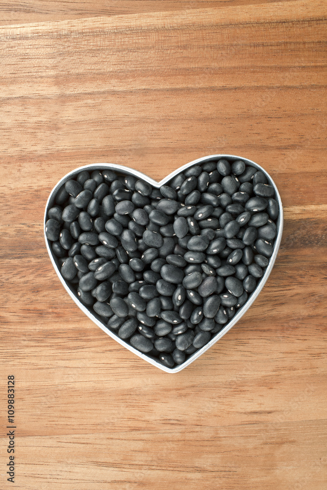 black beans on a heart shape container black beans on a heart shape container