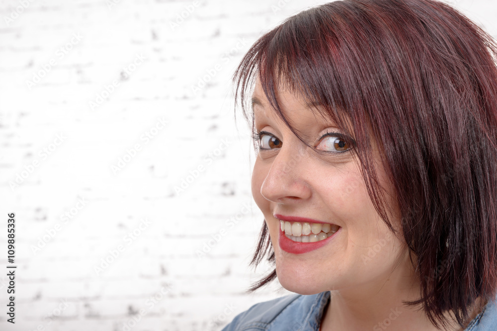 Fototapeta premium Portrait of an attractive fashionable young woman