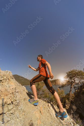 Running man in the summer in a beautiful location.