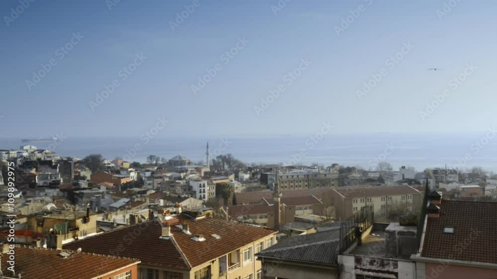 Historic city on the background of the sea
