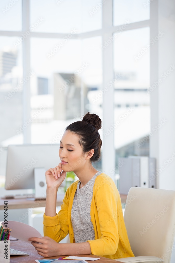 A businesswoman is reading documents A businesswoman is reading documents