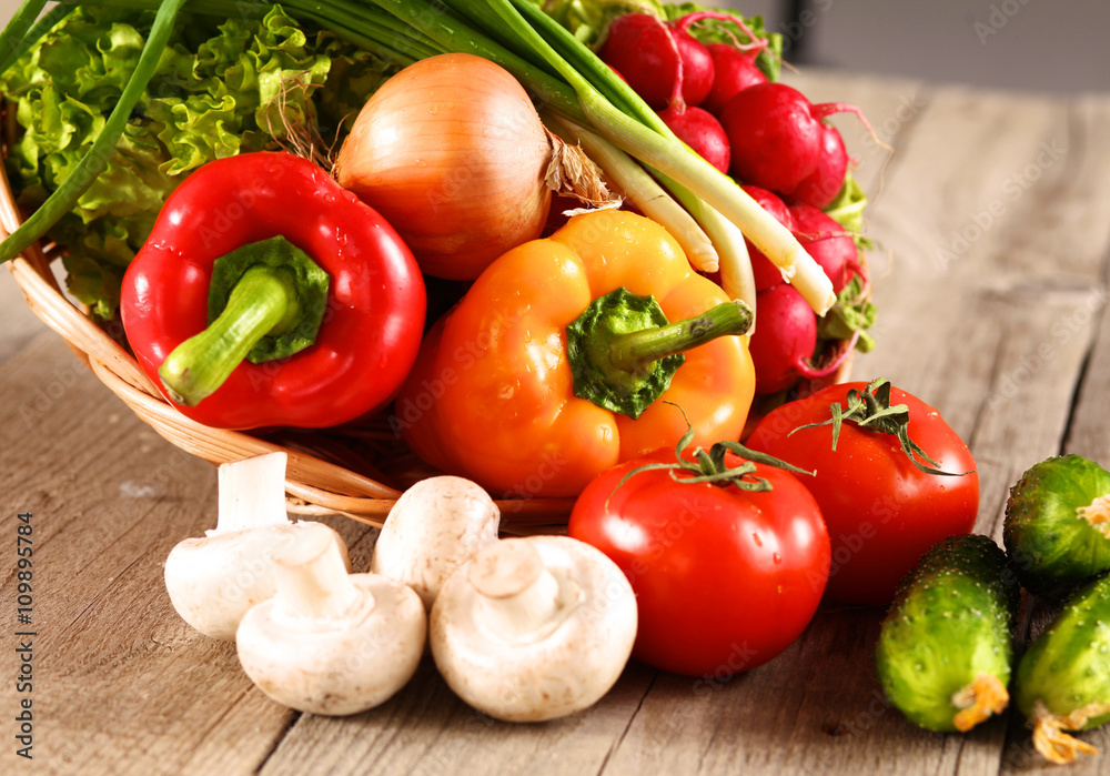 Vegetables . Fresh Bio Vegetable in a Basket. Over Nature Background Vegetables . Fresh Bio Vegetable in a Basket. Over Nature Background
