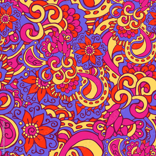 Bright seamless pattern in doodle style, colored in pink, blue, red and yellow colors. Hand-drawn elegant vector ornament.