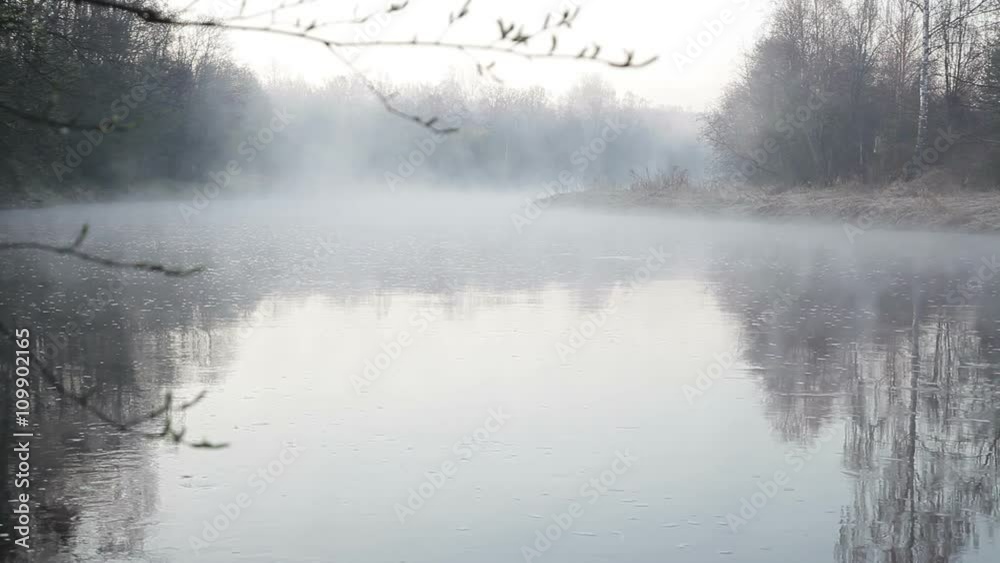 Early morning on the foggy river in the spring in Northern Europe Early morning on the foggy river in the spring in Northern Europe