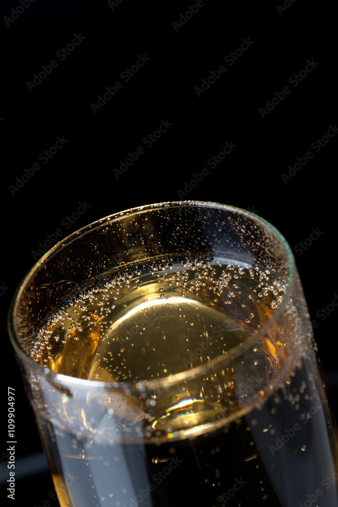 glass filled with champagne. glass filled with champagne.