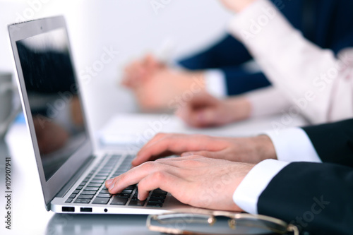 Group of business people working together in office