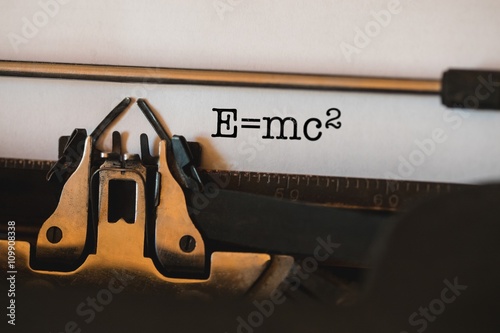 E=mc2 against close-up of typewriter photo