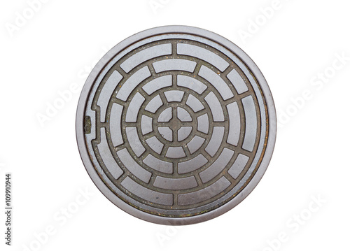 Circle steel manhole cover or drain lid isolated on white backgr photo