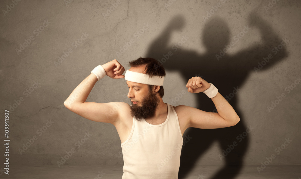 Naklejka premium Skinny man with musculous shadow