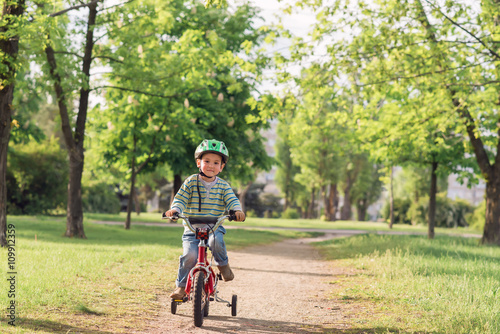 The child riding a bicycle