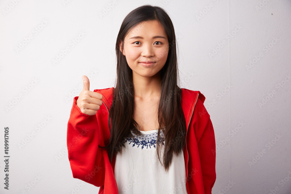 Chinese girl thumbs up