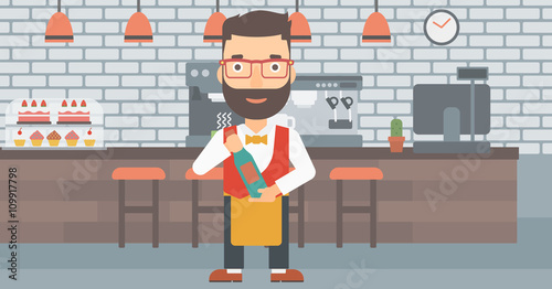 Waiter holding bottle of wine.
