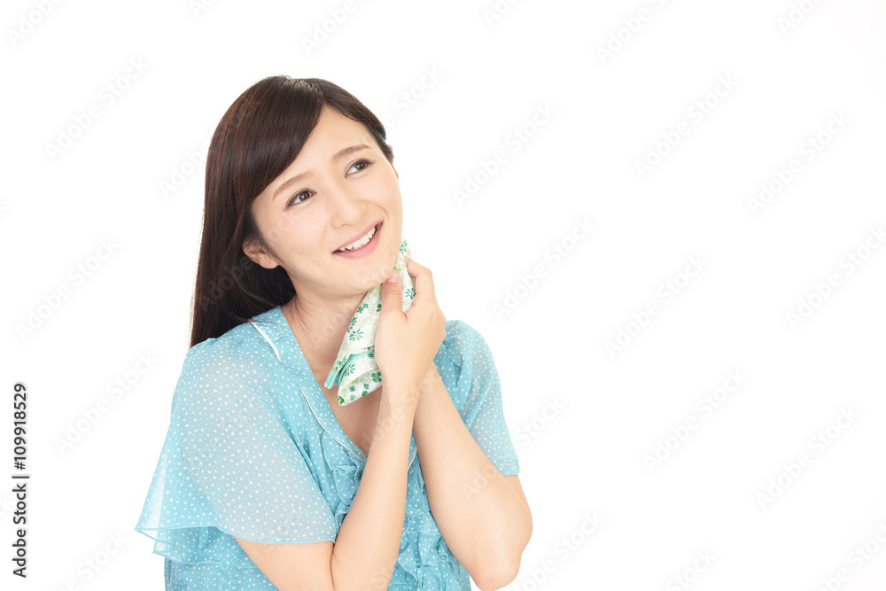 汗を拭く女性 汗を拭く女性
