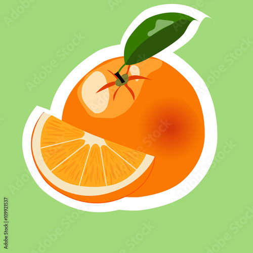 Orange fruit on green background