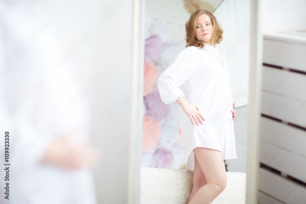 Pregnant woman in bedroom Pregnant woman in bedroom