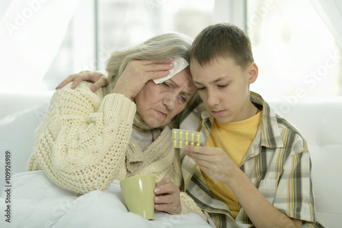  sick  senior woman with her grandson  © aletia2011