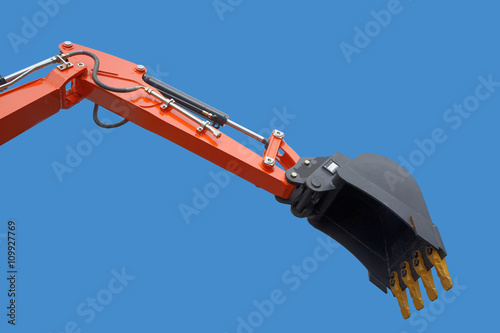 excavator bucket on blue sky