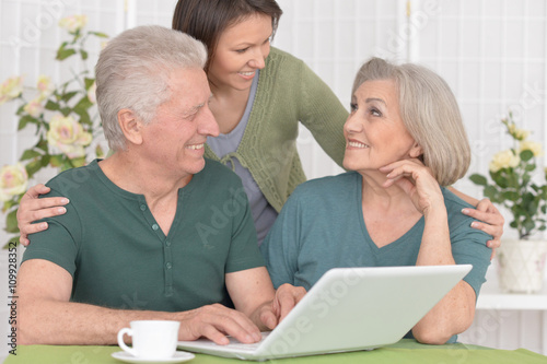 Senior couple with laptop