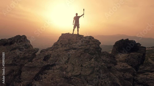 Torch Bearer During The Sunset photo