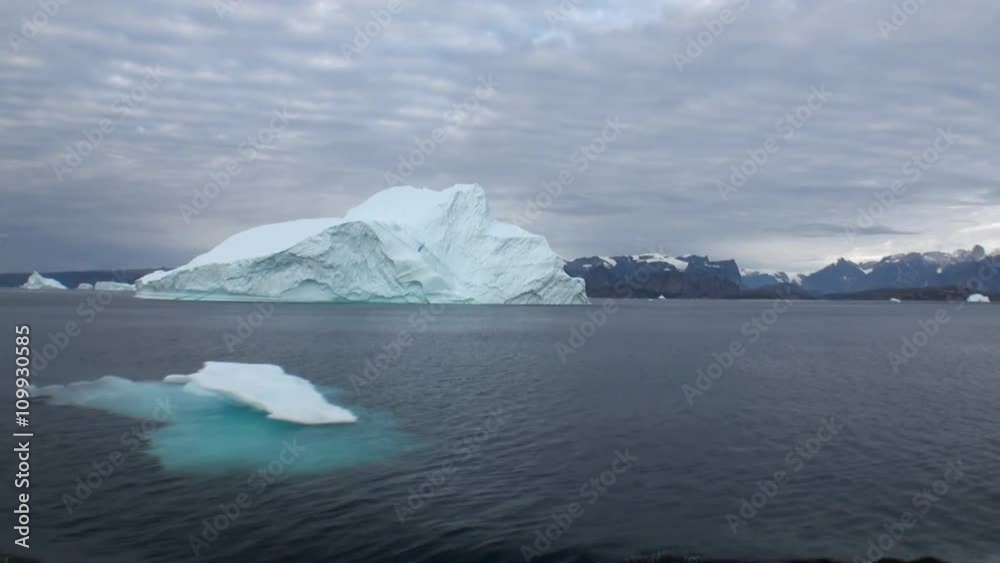Big Iicebergs floating in sea around Greenland in icefjords. Fantastic wonderful amazing video grenland nature iceland. Lovely shooting the life of nature, seaside and mountains. Global warming. Big Iicebergs floating in sea around Greenland in icefjords. Fantastic wonderful amazing video grenland nature iceland. Lovely shooting the life of nature, seaside and mountains. Global warming.
