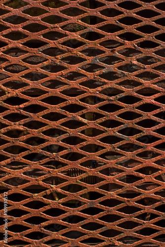 rusty metal grill on an old abandoned train - clearwell caves. photo