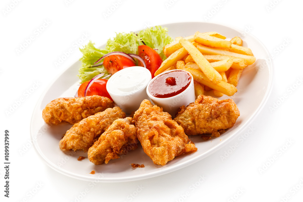Fried chicken nuggets and vegetables Fried chicken nuggets and vegetables