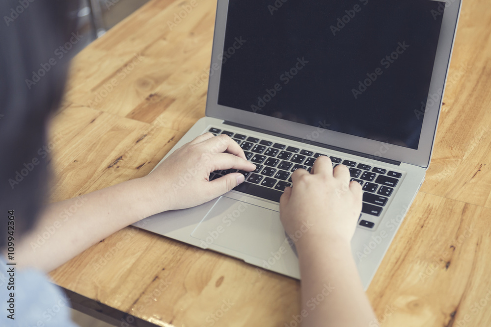 woman's hand typing with laptop computer notebook for working co woman's hand typing with laptop computer notebook for working co