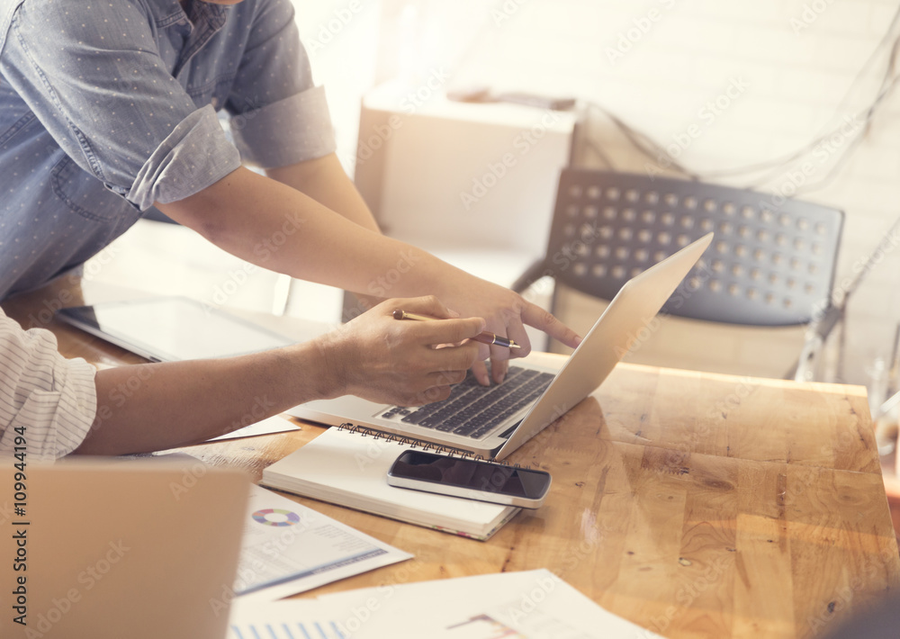 Fototapeta premium people working with laptop computer and business document