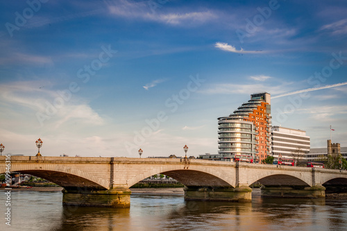 Photography Putney bridge is connecting Fulham to Putney across the river Thames, is the only bridge in britain to have a church at each end, St
