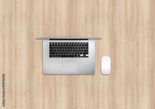 Office table top view mock up image with laptop and mouse. Wooden background