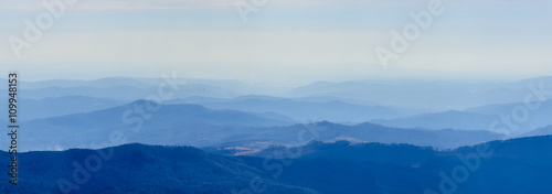 Winter landscape over Carpathian Mountains peaks. Panorama of sn