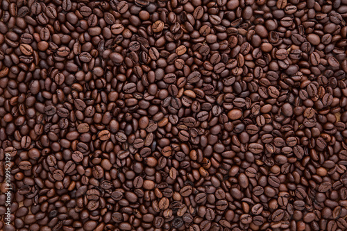 flat lay of brown roasted coffee bean can be used as a backgroun