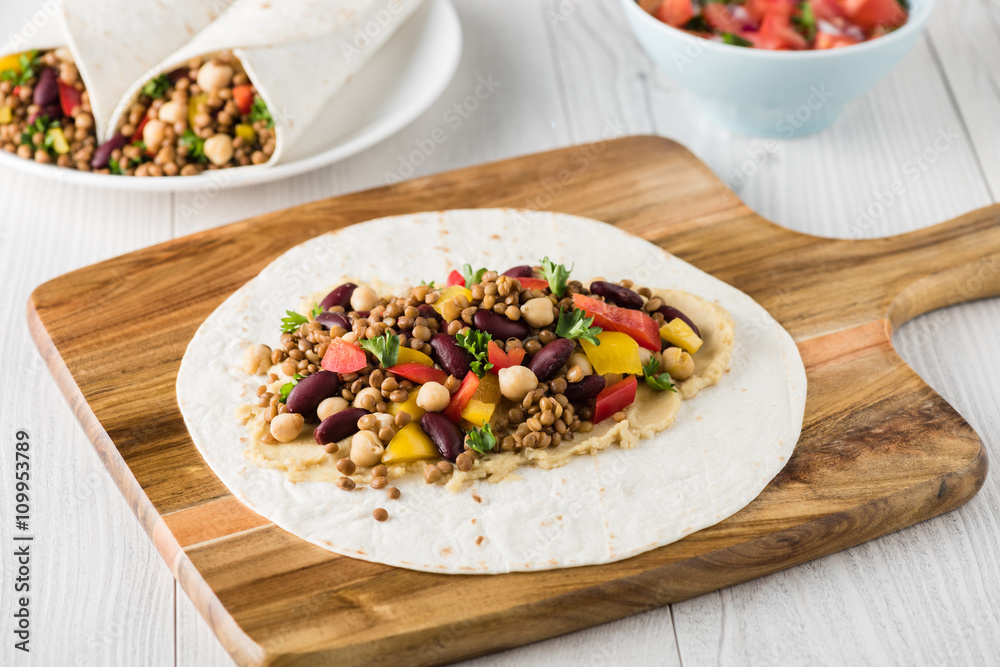 Vegan wraps with lentil, chickpea peppers and kidney bean Vegan wraps with lentil, chickpea peppers and kidney bean