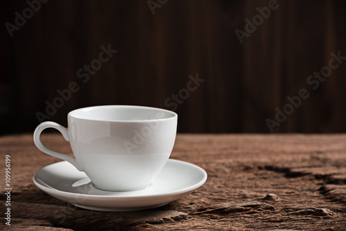 white coffee cup on wooden table
