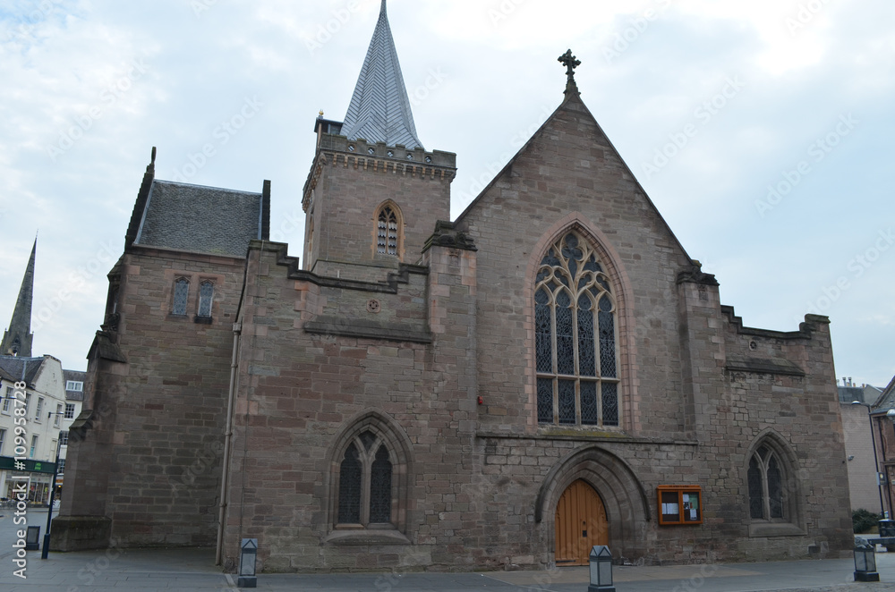Tower and stone walls of saint John's Kirk church in the city of Perth, Scotland