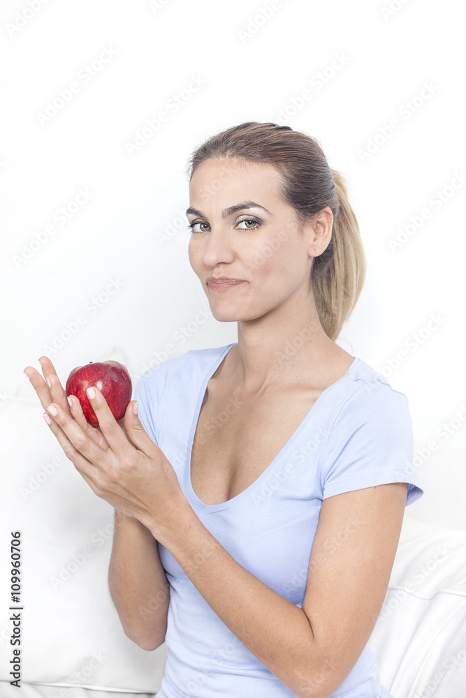Beautiful woman with red apple in hand Beautiful woman with red apple in hand