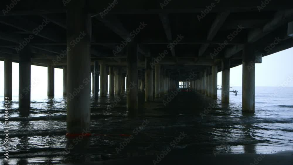 view from under a dark pier view from under a dark pier