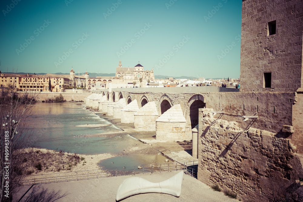 Cordoba,Spain-March 11,2015:Roman Bridge and Guadalquivir river,