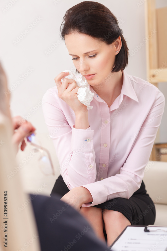 Pretty young woman is consulting a psychotherapist Pretty young woman is consulting a psychotherapist
