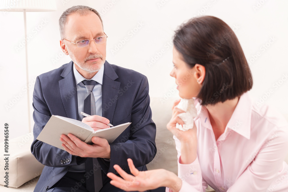 Cheerful young girl is visiting a psychologist Cheerful young girl is visiting a psychologist