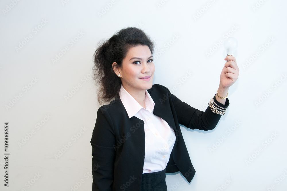 Business woman hold light bulb on white background Business woman hold light bulb on white background